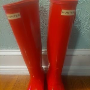 Bright orange hunter rain boots
